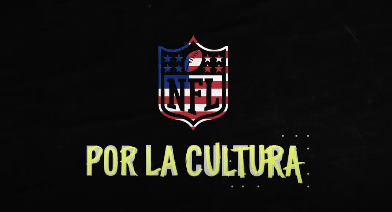 The NFL shield logo with the US Flag and the words Por La Cultura