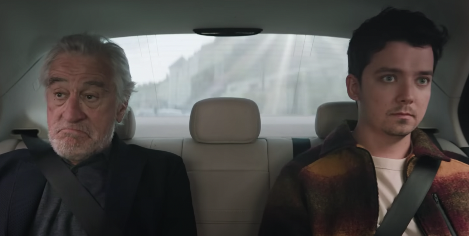 Robert De Niro and Asa Butterfield ride in the backseat of an Uber