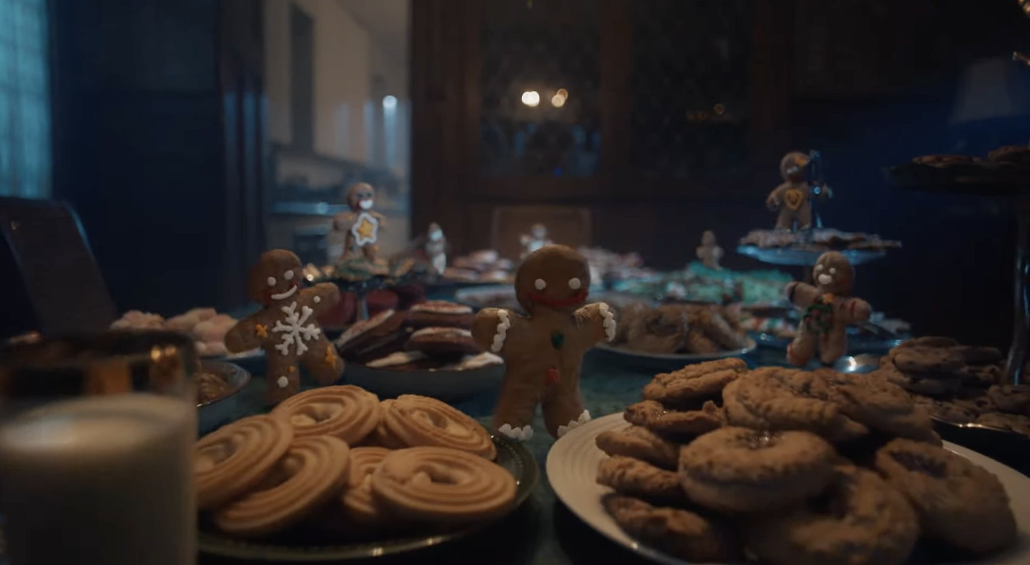 A table of cookies with animated gingerbread men