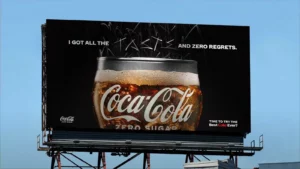 A billboard with a glass of Coke Zero that says "I got all the taste and zero regrets"